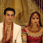 Happy South Asian wedding couple.